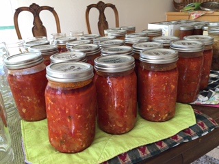 My friend Nancy and I canned 5 cases of salsa , marinara , and whole hierloom tomatoes it was days of hard work but we had fun in the kitchen preserving farm goods